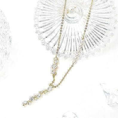 Pure Gold Finish Akoya Baby Pearl Necklace with 7 pearls and CZ stones on ladies collarbone