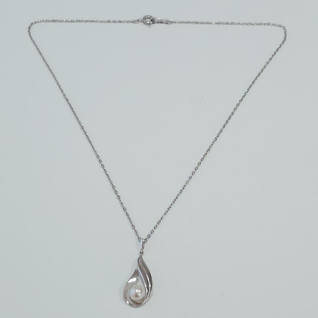 Mikimoto pearl necklace with 6mm pearls on a 40cm sterling silver chain