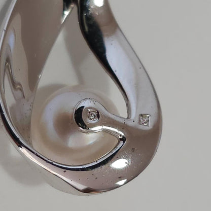 Mikimoto pearl necklace with 6mm pearls on a 40cm sterling silver chain