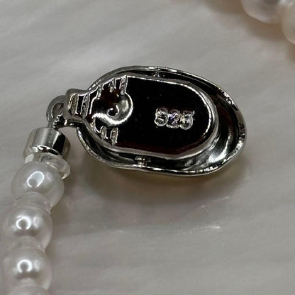 Akoya pearl baby pearl baroque necklace with white pink pearls and 925 clasp on white background