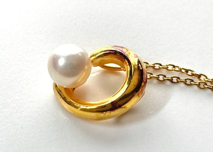 TASAKI pearl necklace in gold color with mother of pearl, displayed with box and guarantee