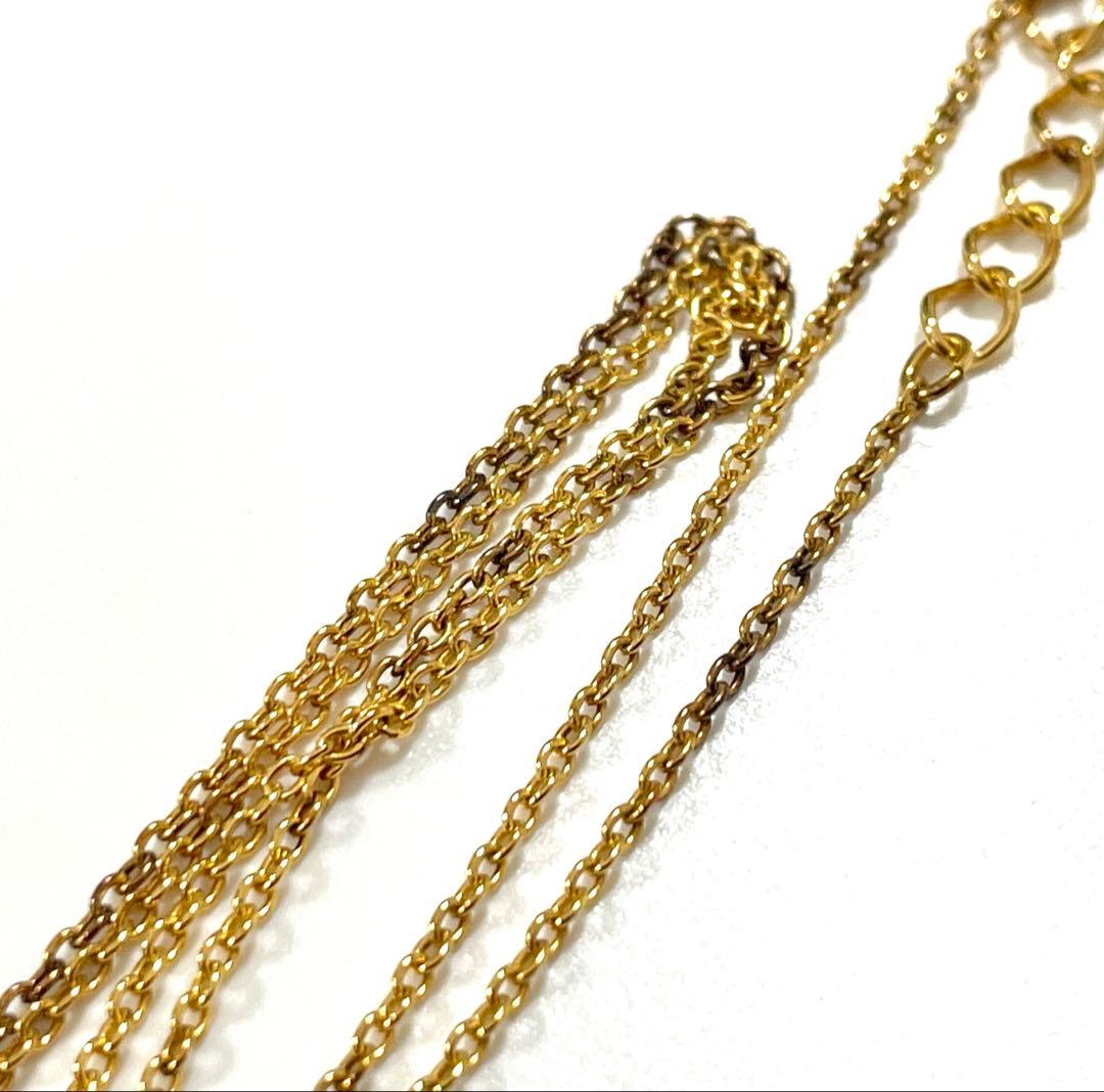 TASAKI pearl necklace in gold color with mother of pearl, displayed with box and guarantee