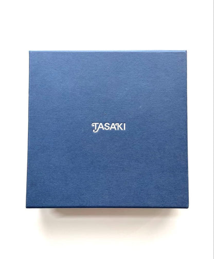 TASAKI pearl necklace in gold color with mother of pearl, displayed with box and guarantee