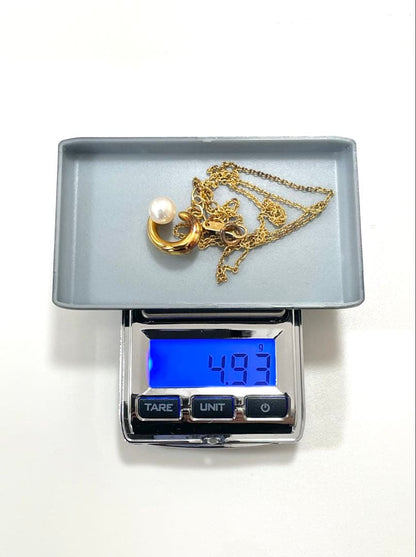 TASAKI pearl necklace in gold color with mother of pearl, displayed with box and guarantee