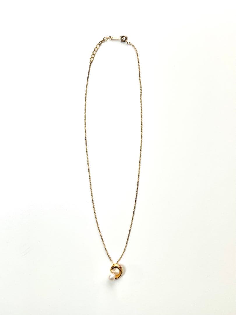 TASAKI pearl necklace in gold color with mother of pearl, displayed with box and guarantee