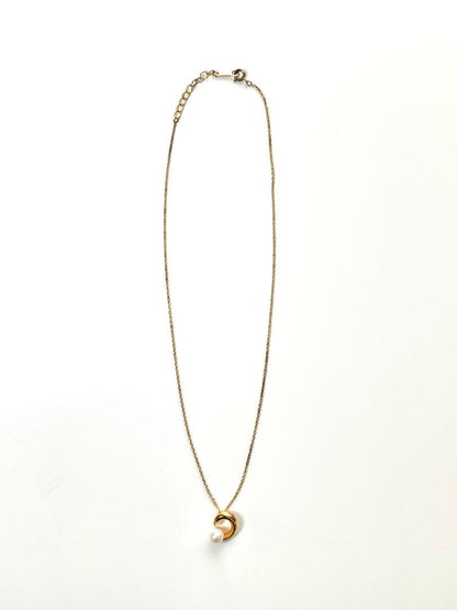 TASAKI pearl necklace in gold color with mother of pearl, displayed with box and guarantee