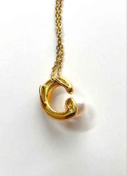 TASAKI pearl necklace in gold color with mother of pearl, displayed with box and guarantee
