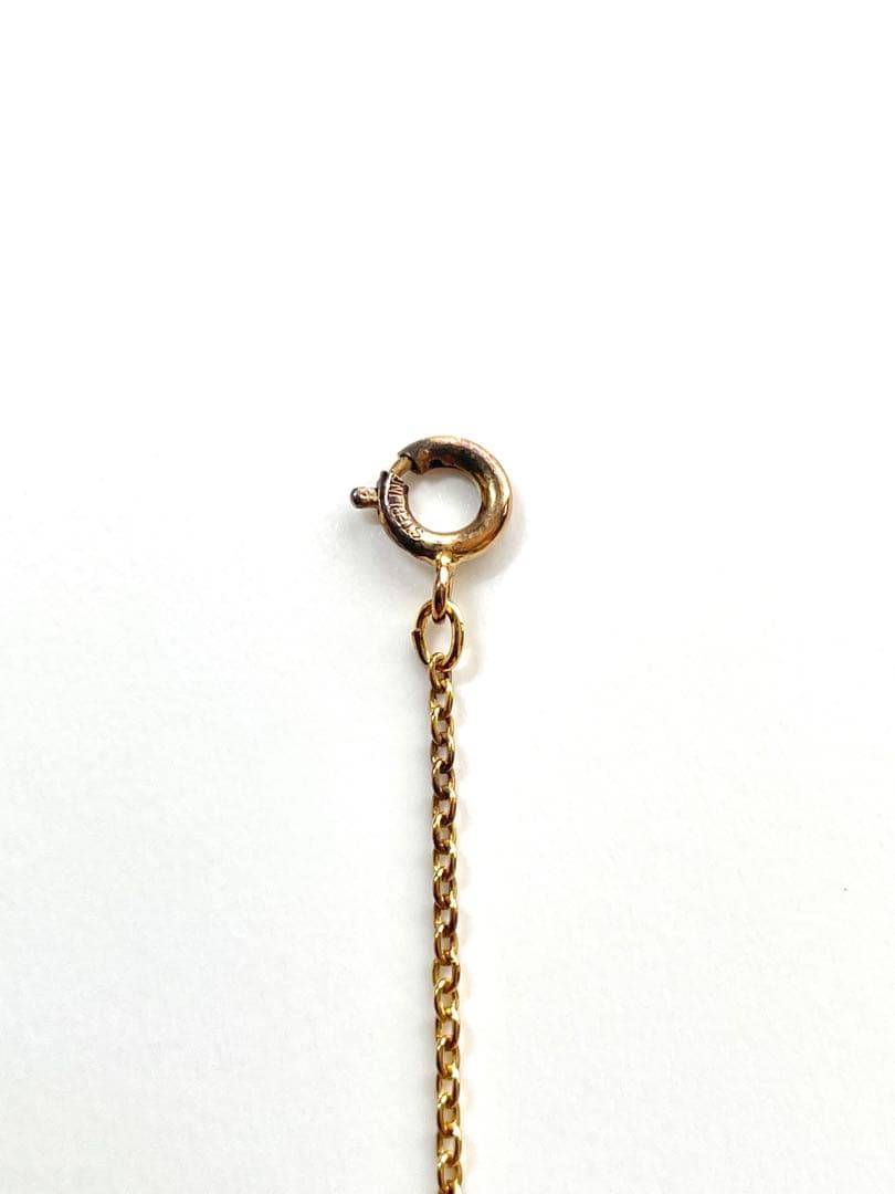 TASAKI pearl necklace in gold color with mother of pearl, displayed with box and guarantee
