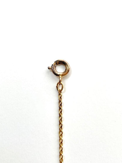 TASAKI pearl necklace in gold color with mother of pearl, displayed with box and guarantee