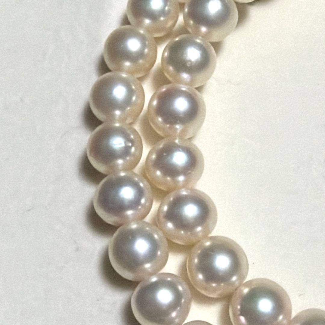 Tasaki Akoya pearl necklace with 8.0-8.5mm pearls and K14 clasp on a white background