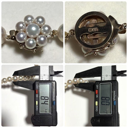 Tasaki Akoya pearl necklace with 8.0-8.5mm pearls and K14 clasp on a white background