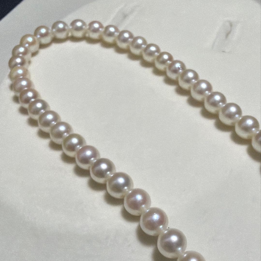 Tasaki Akoya pearl long necklace with 5.5-6mm pearls measuring 109 cm in length