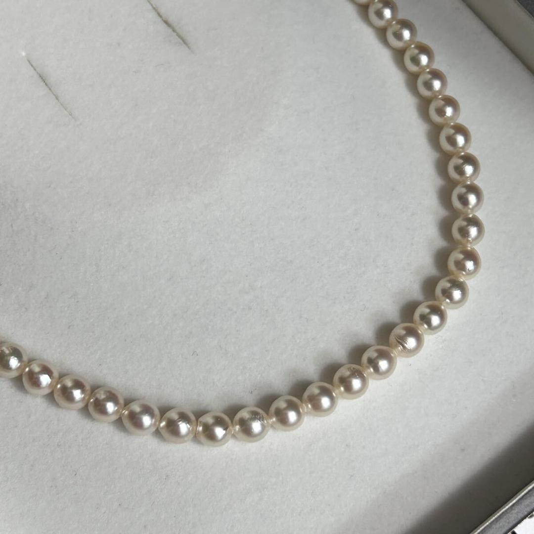 Teriyaki Akoya pearl necklace 7mm pearls on silver chain measuring 43.5cm