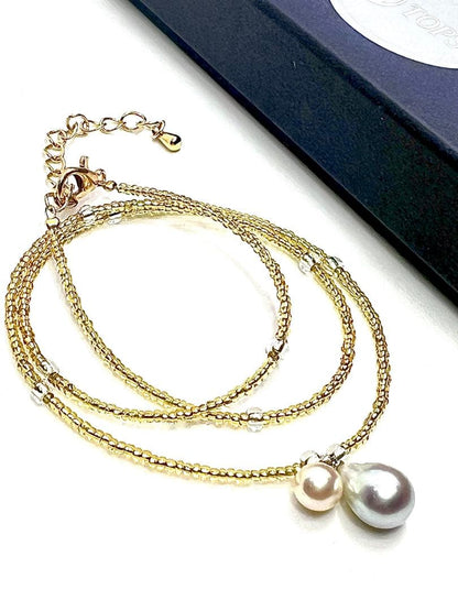 Akoya pearl and blue pearl necklace with Italian K18 gold leaf parts on adjustable chain
