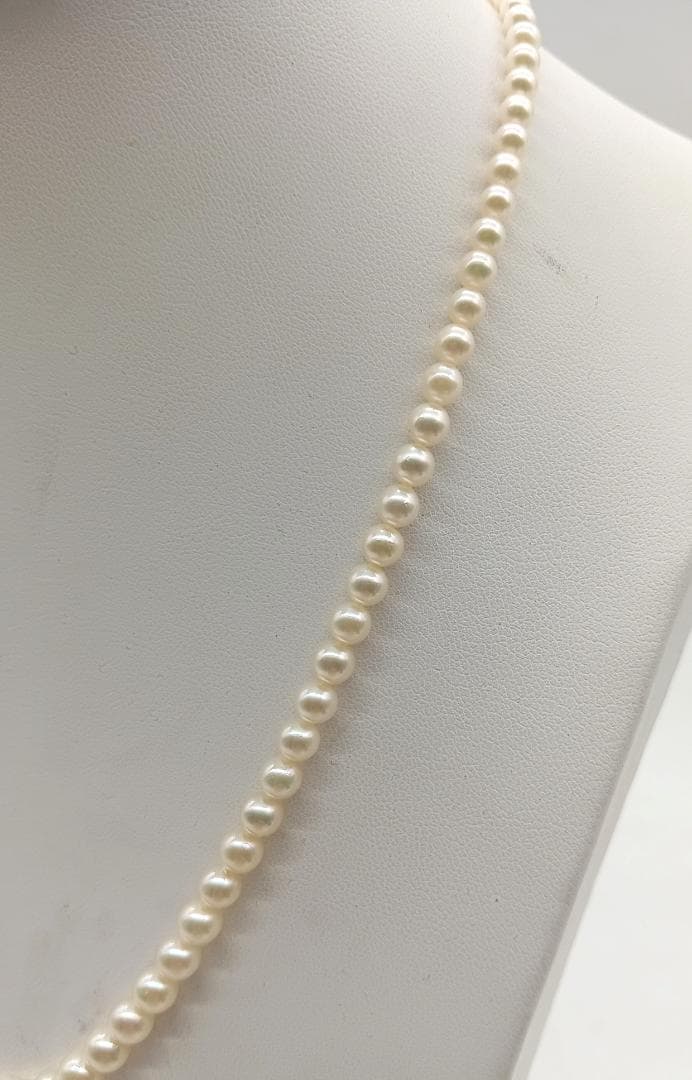 Mikimoto Akoya pearl gradient necklace with pearls ranging 3 to 7 mm displayed with velour case