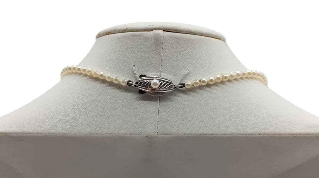 Mikimoto Akoya pearl gradient necklace with pearls ranging 3 to 7 mm displayed with velour case