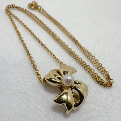 Mikimoto Gold Color Akoya Pearl Pendant with silver pendant and 16-inch chain on white background