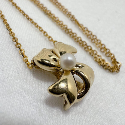 Mikimoto Gold Color Akoya Pearl Pendant with silver pendant and 16-inch chain on white background