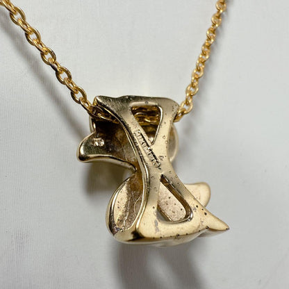 Mikimoto Gold Color Akoya Pearl Pendant with silver pendant and 16-inch chain on white background