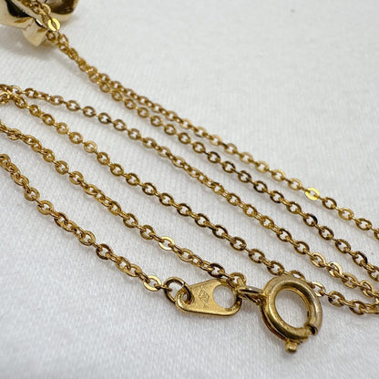Mikimoto Gold Color Akoya Pearl Pendant with silver pendant and 16-inch chain on white background