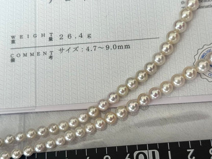 Multi-colored Akoya pearl gradient necklace 4.7-9mm on white background with certificate