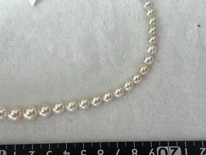 Multi-colored Akoya pearl gradient necklace 4.7-9mm on white background with certificate