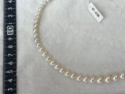 Multi-colored Akoya pearl gradient necklace 4.7-9mm on white background with certificate