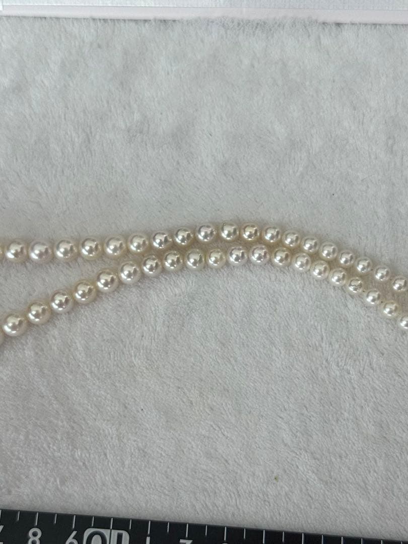 Multi-colored Akoya pearl gradient necklace 4.7-9mm on white background with certificate