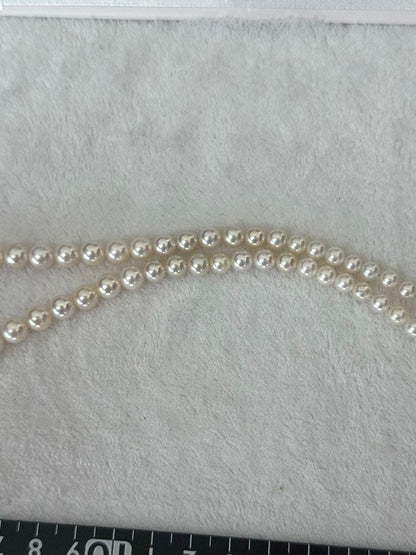 Multi-colored Akoya pearl gradient necklace 4.7-9mm on white background with certificate