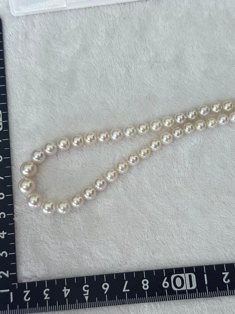 Multi-colored Akoya pearl gradient necklace 4.7-9mm on white background with certificate