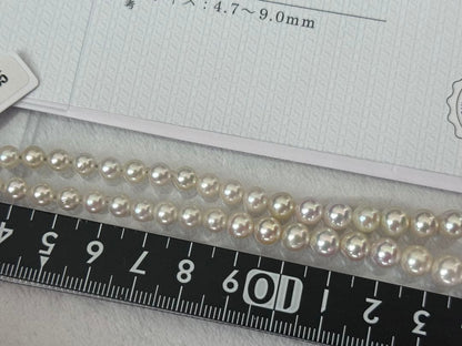 Multi-colored Akoya pearl gradient necklace 4.7-9mm on white background with certificate