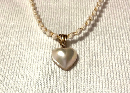 Tasaki Maeboule Pearl Heart pendant top in 18K yellow gold with V-shaped bail and 12mm pearl