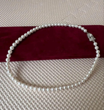 Mikimoto Pearl Island necklace featuring 5mm Akoya pearls on a 40cm strand with accessory case