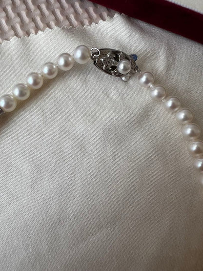 Mikimoto Pearl Island necklace featuring 5mm Akoya pearls on a 40cm strand with accessory case