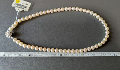 Akoya pearl necklace, platinum ring size 11, and matching earrings set with silver clasp