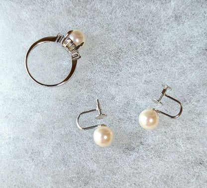 Akoya pearl necklace, platinum ring size 11, and matching earrings set with silver clasp