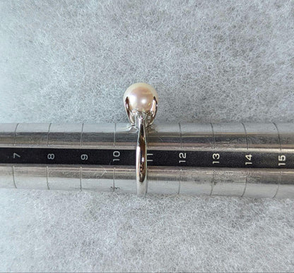 Akoya pearl necklace, platinum ring size 11, and matching earrings set with silver clasp