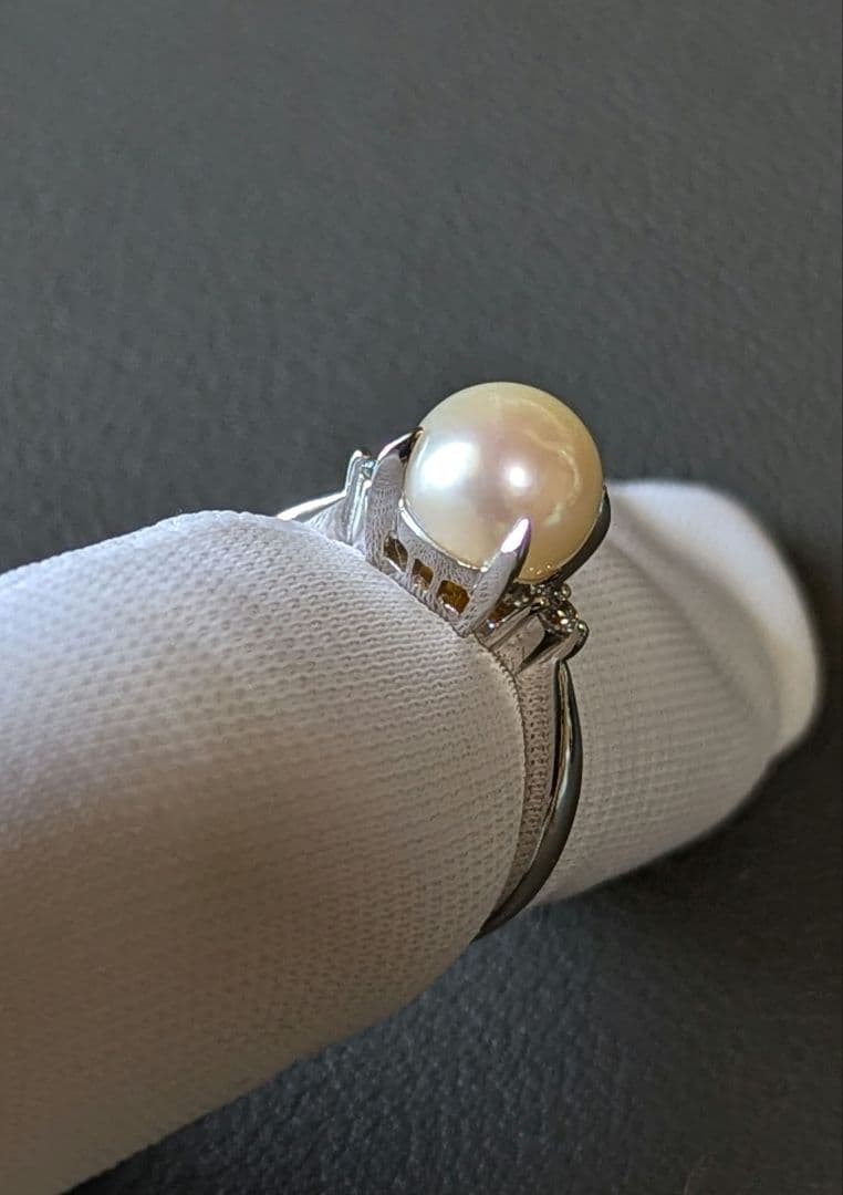 Akoya pearl necklace, platinum ring size 11, and matching earrings set with silver clasp