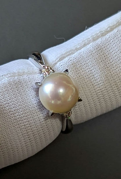 Akoya pearl necklace, platinum ring size 11, and matching earrings set with silver clasp
