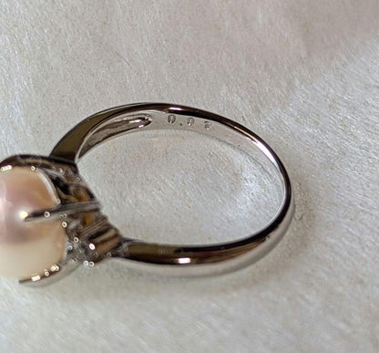 Akoya pearl necklace, platinum ring size 11, and matching earrings set with silver clasp