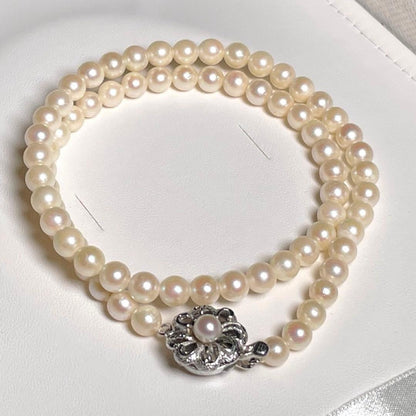 Akoya pearl baby pearl necklace with 5.5-5.9mm round white pearls on a 42.1cm silver chain