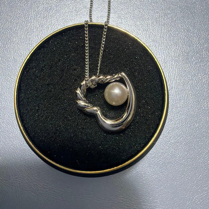 Tasaki SV925 Open Heart Pearl Necklace with 1.9 cm pendant on 41 cm chain, silver heart-shaped design with pearl