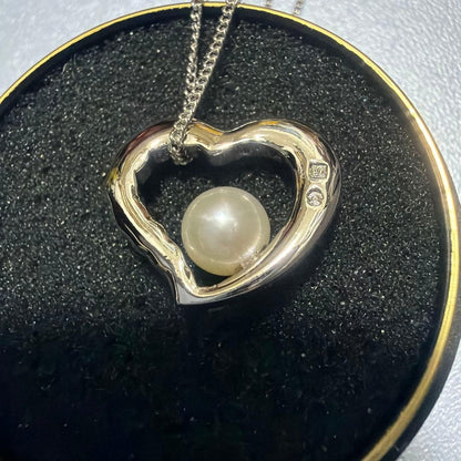 Tasaki SV925 Open Heart Pearl Necklace with 1.9 cm pendant on 41 cm chain, silver heart-shaped design with pearl