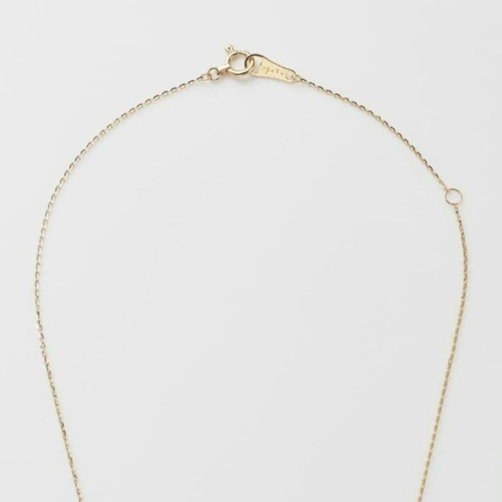 Agaat Opal necklace featuring a 0.6 x 0.4 cm opal pendant set in K10 gold on a 40 cm chain