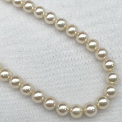 Aqoya Pearl Hanadama necklace with white pearls sized 6.5-7mm and silver clasp