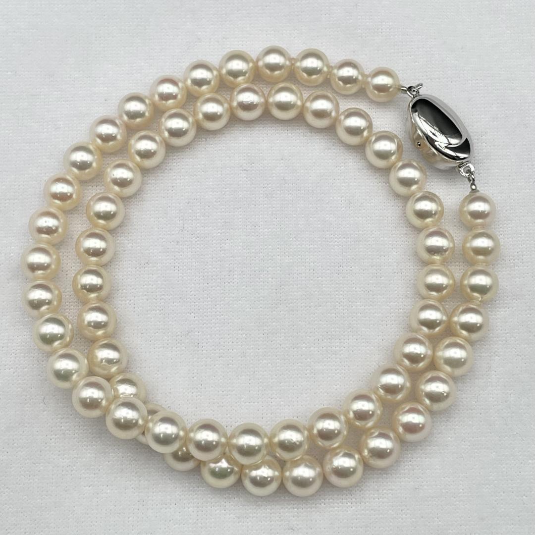 Aqoya Pearl Hanadama necklace with white pearls sized 6.5-7mm and silver clasp