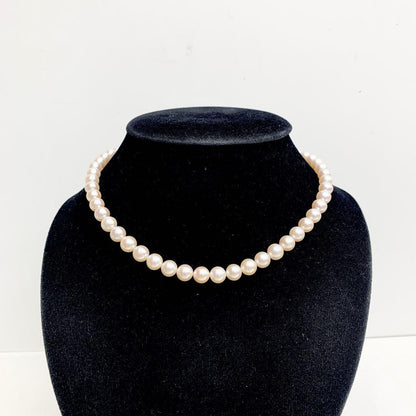 Tasaki pearl necklace with 7.5-8.0mm pearls on a 42cm silver chain with guarantee tag