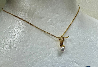 MIKIMOTO K18 gold pendant top featuring a 6.3mm white pearl weighing 1.6g