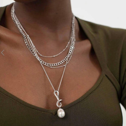 MISSOMA Molten Baroque Pearl Necklace with 30mm x 12mm pendant on 22-inch gold chain