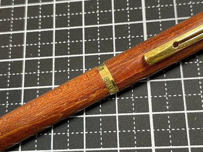 Pilot Grandee ballpoint pen with brown wooden body and gold metal accents